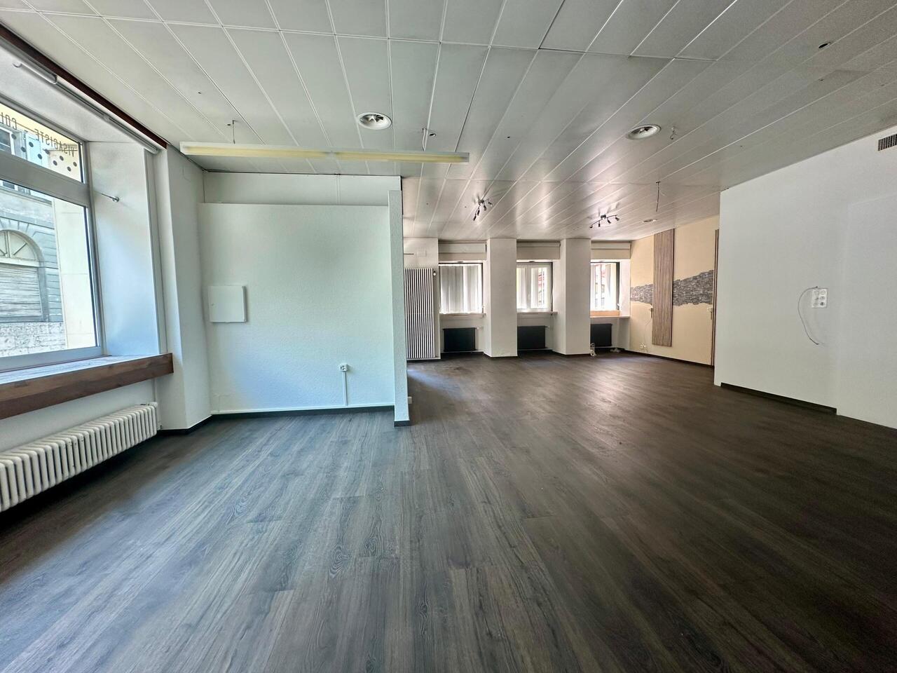 130m² commercial, photo 1 sur 5