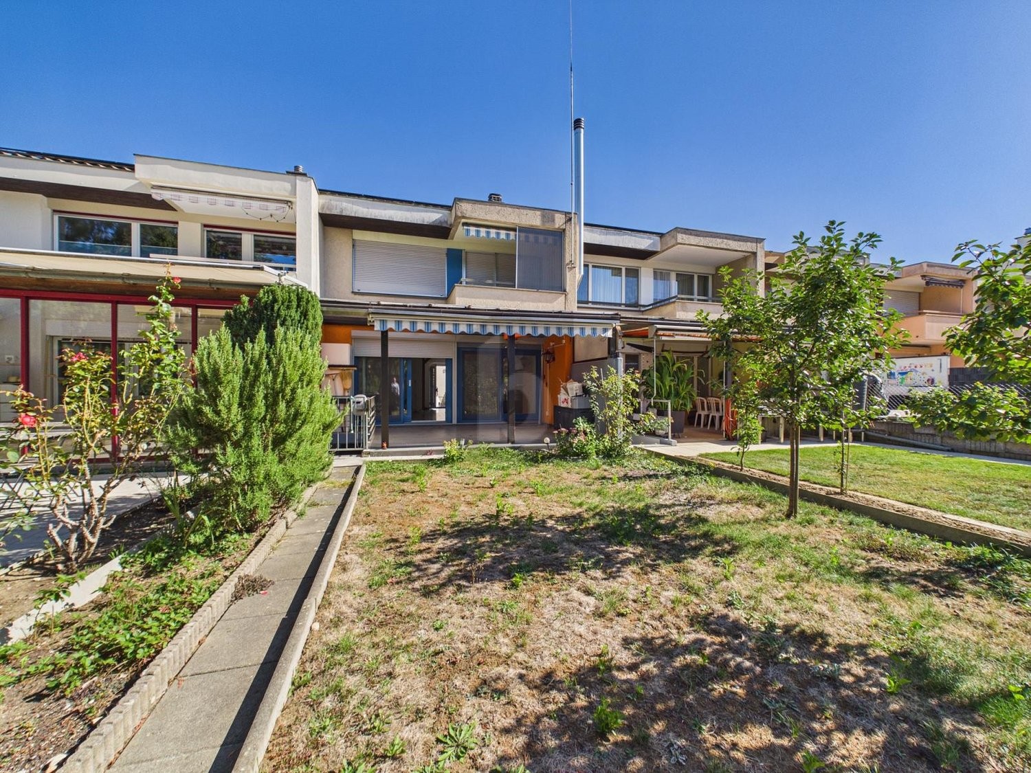 Maison de ville de 2 ½ pièces, photo 1 sur 4