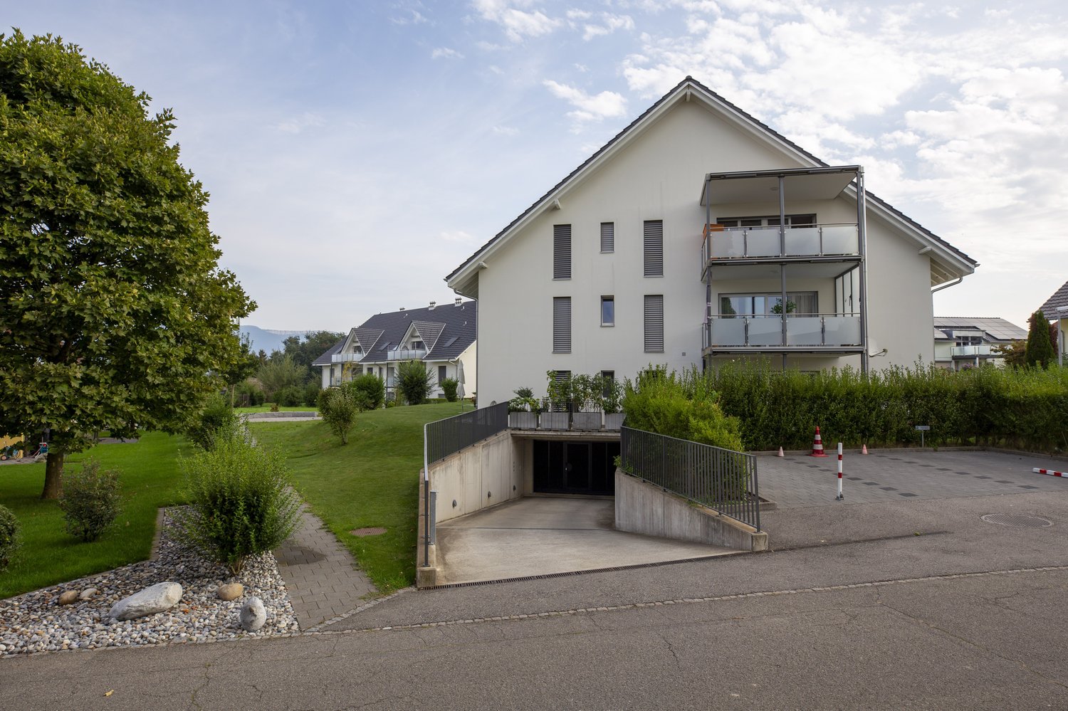Place de parc ouvert de 8m², photo 1 sur 3